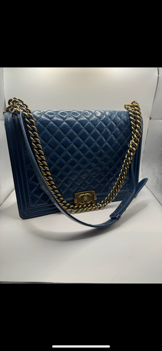 Authentic Chanel Boy Bag Blue Quilted Leather with Gold Chain