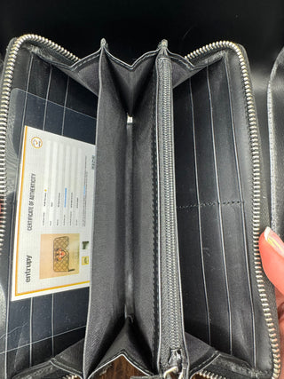 Gucci GG Supreme Tiger Zippy Wallet